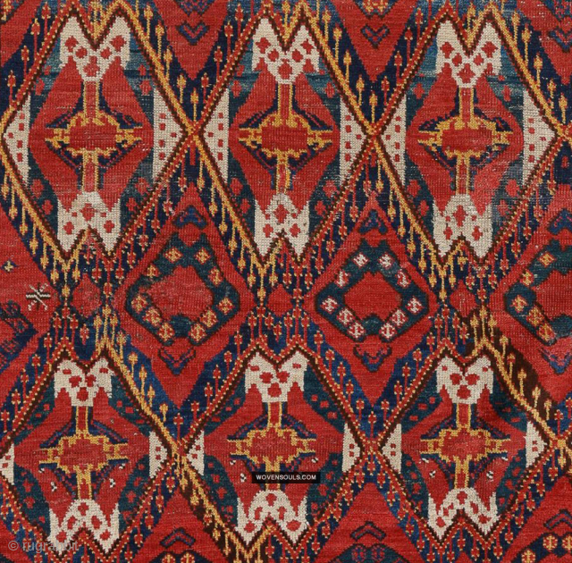 Ersari Rug / NOTE the remarkable inclusion of a girl motif. Good condition in general.Some areas of wear but mostly even pile. 152 cm x 239 cm. 
See more of this rug  ...