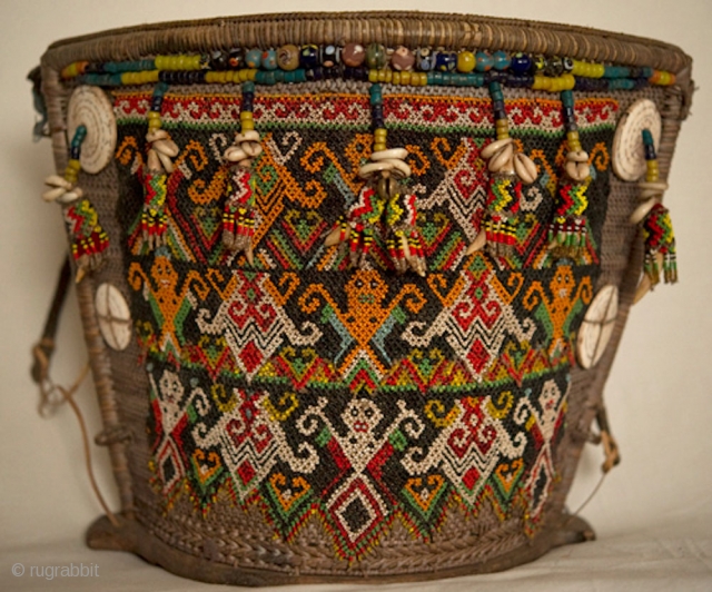 Auction Announcement: Rare Antique Tribal Textiles, Jewelry & Folk Art | June 30th, 2013 | Artfact.com | http://www.artfact.com/catalog/searchLots.cfm?scp=c&catalogRef=EP758QJN7M
LOT 156 : Museum Quality Dayak Baby Carrier from Kalimantan, Borneo     