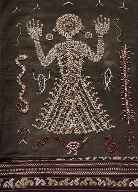 Superb Old Sumba Ceremonial Weaving with Shells & Beads called Lau Wuti Kau. Exceptional layout and attention to detail. See more here https://wovensouls.com/products/1144-old-sumba-ceremonial-skirt-weaving-with-shells-beads-lau-wuti-kau 
Enjoy the visual feast!      