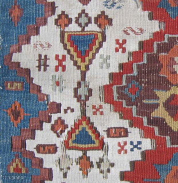 Anatolian Village Kilim, probably Gaziantep, South East Anatolia,pre 1900s. Scores very high on the 'Soul' element.
It is in a 'lived heartily & weary' condition and needs be provided with tender loving care.  ...