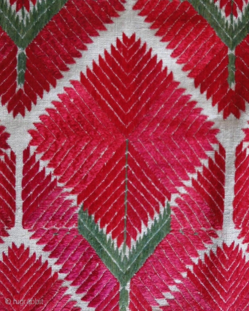 A superb red Phulkari with rose motifs. Red silk floss on hite single-warp base cloth https://wovensouls.com/collections/antique-thirma-red-white-phulkari                 