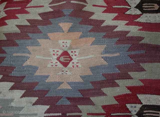 An old “eye dazzler” Manastir kilim from the Kotel region of central Bulgaria from about the 1930s. Finely woven wool on fine cotton warp, natural and aniline dyes (incl. orange). Faded on  ...
