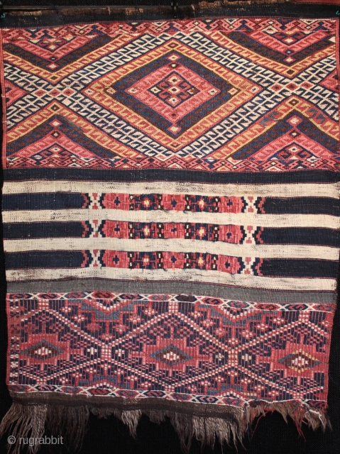 An interesting antique east Anatolian Malatya kilim fragment from the second half of the 19th century displaying four different weaving techniques as you can see in the three closeup photos below; a  ...