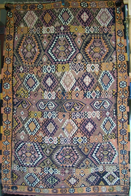 An interesting and unusual tribal east Anatolian kilim from the Kars Kagizman or Van Hakkari area.

Opinions among kilim aficionados differ slightly as this kilim shows design elements seen in tribal kilims from  ...