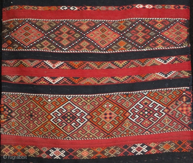 An old Anatolian long kilim runner, tightly woven flat weave with very fine çiçim and soumak embroidery, I estimate from the 1920s. Excellent drawing, good colours and in very good condition. 285x84cm

For  ...