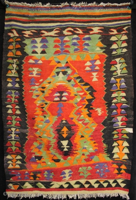 An extraordinary primitive and expressionistic yoruk prayer kilim from Cal in Western Anatolia. The bright colours and spontaneous weaving belie the fact that this kilim has some age to it. I estimate  ...