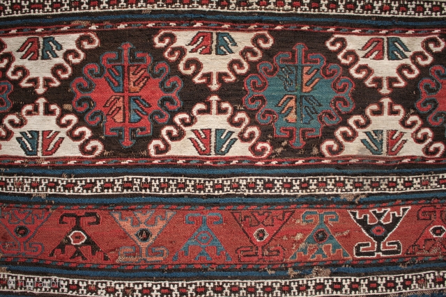 Antique Shahsavan soumac and kilim mafrash panel.

Unusually still with part of its striped kilim base intact, this mid 19th century Shahsavan mafrash is in original condition, finely woven and with good colours.  ...