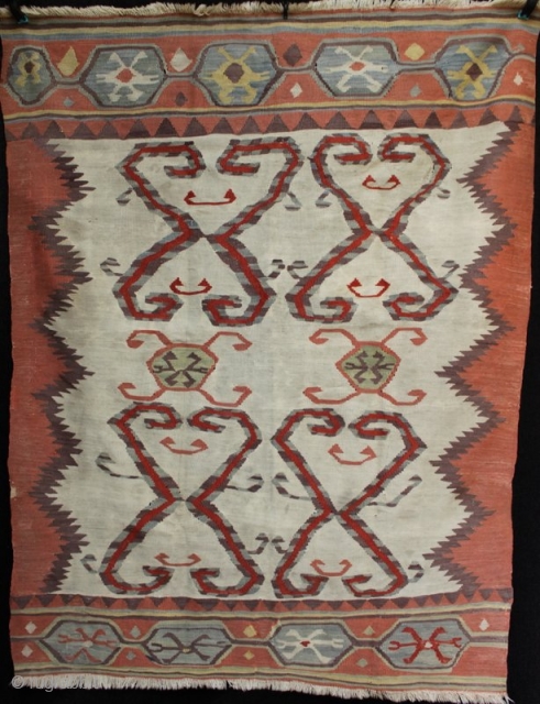 An interesting and unusual antique Anatolian kilim sofra from the village of Hotamis near Konya. Tightly woven, fine kilim with charming primitive drawing of motifs. In good condition with a small repair  ...