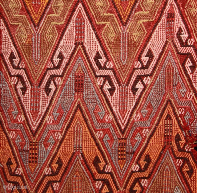 Finely woven long, narrow zili embroidered kilim made by Horzumlu-Aydinli yoruk nomads from Hatay in east Anatolia.

Wintering in Hatay near the Syrian border, the Horzumlu-Aydinli nomads had their summer pastures in the  ...