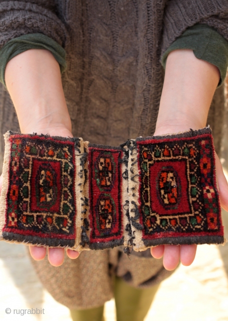 Miniature Turkoman or Turkmen khorjin saddle bag

Only 9 inches long and 5 1/2 inches wide, an unusual and collectible bag. In very good overall condition with some of the simple wool closing  ...