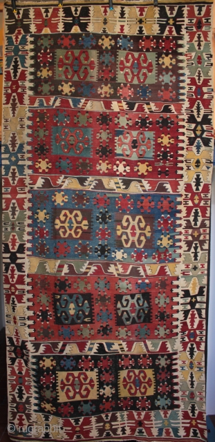 Large mid 19th century central Anatolian kilim
is it from central Anatolia (Taspinar?) or even Cappadocia? The jury is still out as no directly comparable examples have yet come to light!

Acquired between 1909  ...