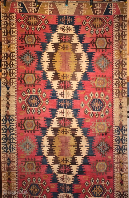 Finely woven and crisply drawn old east Anatolian kilim from Adana with an unusual and particularly lovely field background colour. In excellent usable condition. Size 442 x 156cm.

For detailed photos, see the  ...