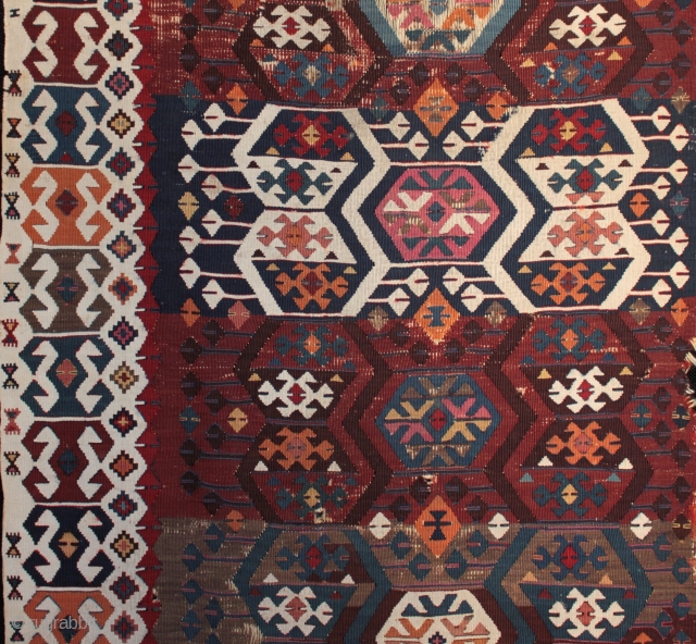 Antique east Anatolian kilim from the Reyhanli/Malatya area with beautiful natural colours

In good original unrestored condition with corroded brown in the upper centre (normal for a kilim of this age) and a  ...