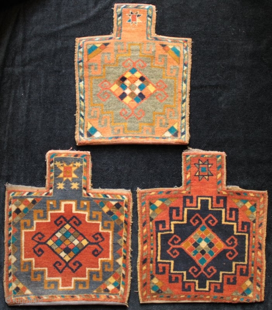 A unique set of 3 charming and very finely knotted salt bags with striped kilim backs each woven in one piece, unstitched at the edges. The Memling guls, checkerboard centres, positive and  ...