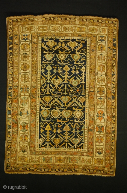 Caucasian Schirwan Rug some old repaires done on this piece! Some synthetic colors including obvious faded fuchsine, a dye that started out as vibrant purple and becomes gold and beige with exposure  ...