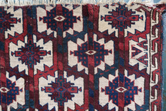 Fragment of an old, rare and colorful turkmen asmalyk (89 cm. x 55 cm.) Very fine weaving with asymmetrical knotting open to the right. Spacious drawing with incredible deep old colors. 3  ...