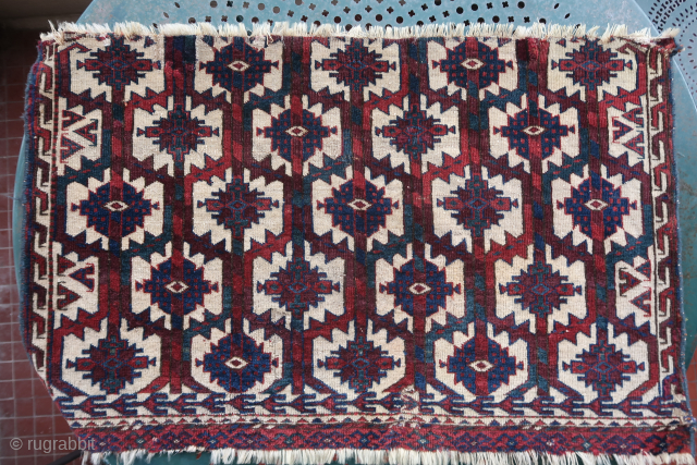 Fragment of an old, rare and colorful turkmen asmalyk (89 cm. x 55 cm.)
Very fine weaving with asymmetrical knotting open to the right. 
Spacious drawing with incredible deep old colors. 
3 small  ...