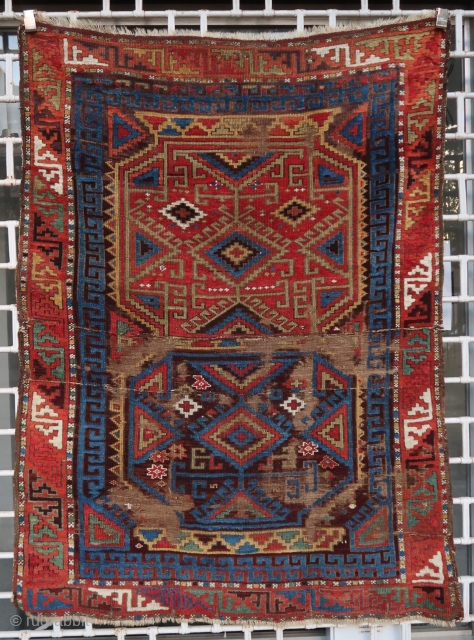 Rare, old and colorful Konya double medallion fragmented rug (156 cm x 137 cm / 4ft 5in x 5ft 11in).
Incredible colors and extremely nice archaic labyrinth medallion design.
Condition visible on pictures, better  ...