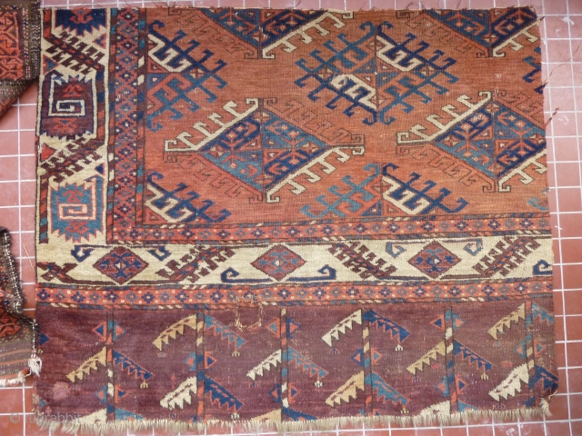 Fragment of a fine old Yomud main carpet.
A complete sample: border, skirt and field. As found condition, needs a bath and a good home.
104cm x 84cm       