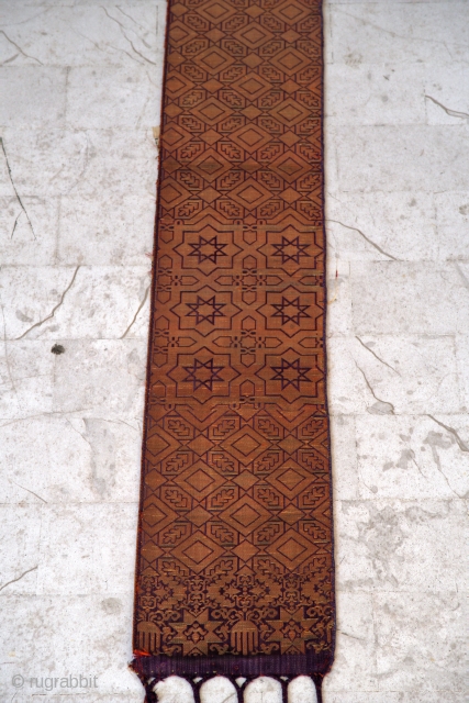 Two fragments of a Hzam, half-belt from Fez, (240cm x 18cm), Morocco, brocatelle patterned in gold with diamonds and Cherifian crosses, and rose patterned in gold with polka dots, hands of Fatima  ...