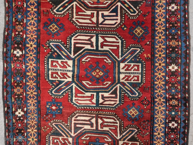 Rare, old and beautiful traditional Karabagh "turtle" 4 medallions rug (270 cm. x 130 cm.) Good condition for its age with high pile all over, some moth bites, few rows of black  ...