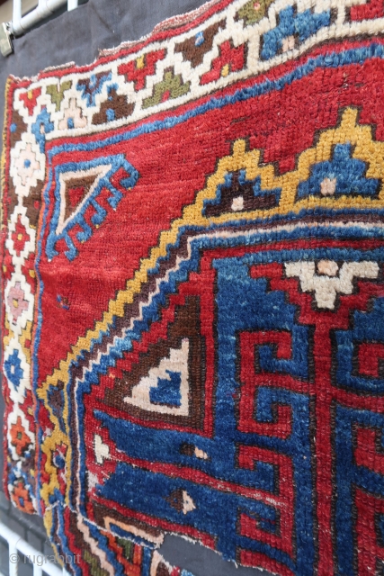 Big old and colorful central anatolian rug fragment (fragment itself: 135 cm x 95 cm) A A rustical piece with thick pile and beautiful dyes. Very decorative and powerful as a hanging,  ...