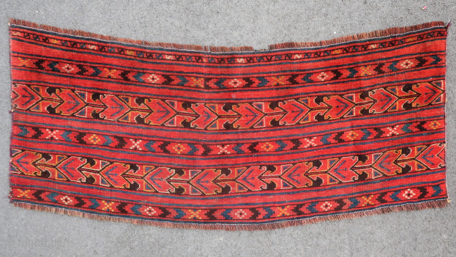 Old Ersari piece of a rare type ( 130 cm. x 50 cm.). Unusual and traditional design. Reduced and secured on all sides, a cut has been resewn (visible on the last  ...