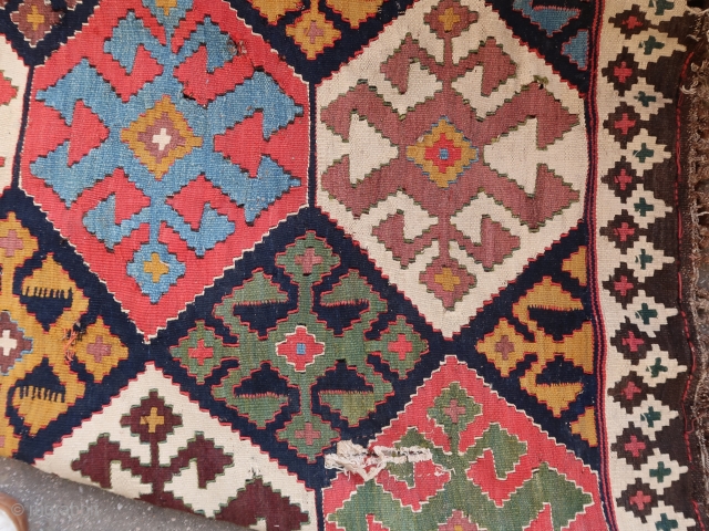 Old, rare, and colorful complete Kilim for a resto project (284 cm. x 177 cm.) Extraordinary dyes and playful visual schema. In need of a skillful restorer + a good collector's home.  ...