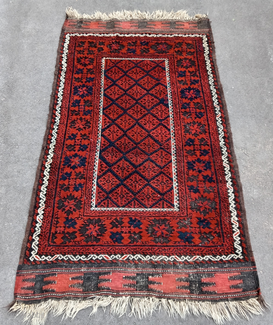 Old and colorful Baluch rug (176 cm. x 96 cm.)
Very good condition for its age, complete, with corroded black, intense solid orange and deep blue ground.
Only few very small moths bites.
Shipping worldwide ...