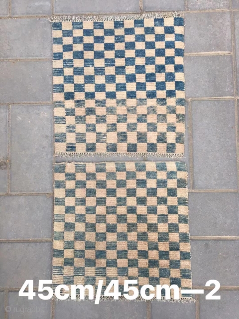 Tibetan rug, blue white square checker board, about late Qing Dynasty. A pair of cushion. Size 45*45cm(18*18”)                