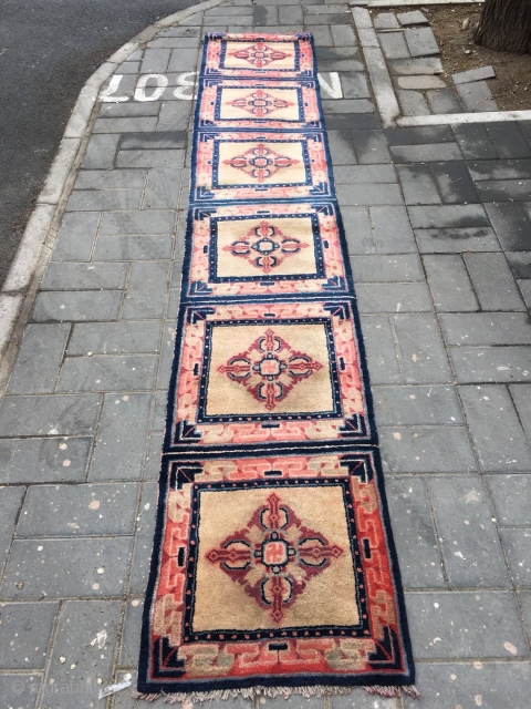 Ningxia runner carpet, six joined mats, light camel background with Buddha turns wheel veins. Very good age and condition.size 355*60cm(138*23”)             