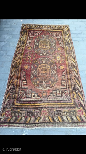 Xinjiang Khotan rug, red background with double group flower pattern, synthetic colors, lucky clouds selvage. Size 270*136cm (105*53”)               