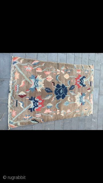 Tibetan rug, light camel background with nice peony flower pattern. Good age and condition. Size 138*88cm(54*34”)                 