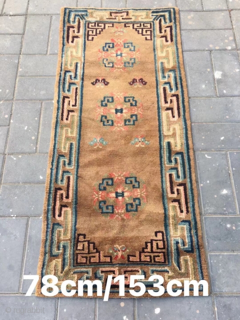 Tibetan rug, very nice camel background with three group flowers veins. Wool warp and weft . Very good and light wool quality. About late Qing Dynasty. Complete one. No any repair. Size  ...