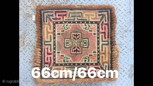 Tibetan rug, square seating rug, wool warp and weft.single cross flower with lucky cloud veins. About mid Qing Dynasty, good condition no any repair. Size 66*66cm(26*26”)       