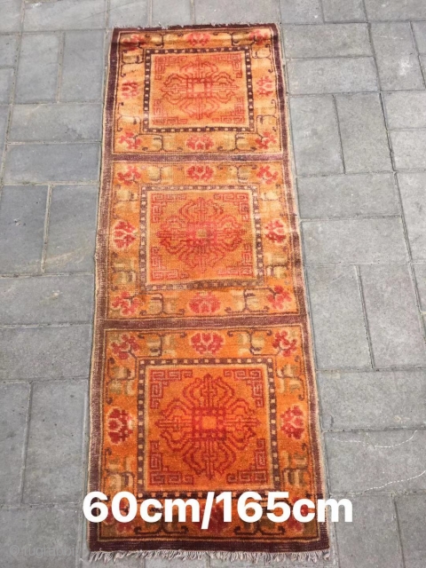 Ningxia rug, orange color with Buddha wheel veins. It was produced in early 20th century. Good age and condition. Size 60*165 cm(23*164”)           