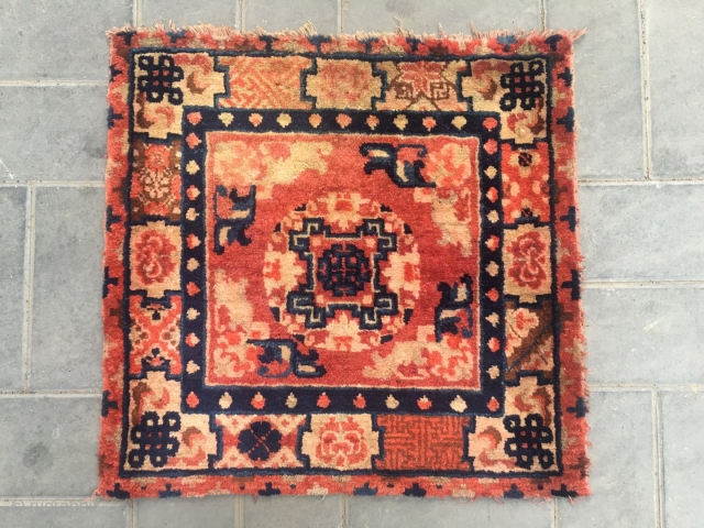 #2045 Baotou rug, lama sitting mat, red background with single group flower veins, around four bats and flower selvage. Good age and quality. Size 70*70cm(27*27")        