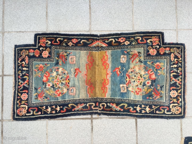 #2049 Tibet horse saddle, moon blue background with group flowers pattern, around eight treasures of Buddha selvage. Good age and quality. Wool warp and weft. Size 123*62cm(48*24")      