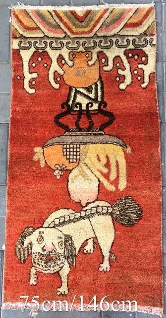 Chinese Xinjiang Khotan rug, red background with very rare lion pattern. About 1930. Good condition. Size 75*146cm(29*58”)                