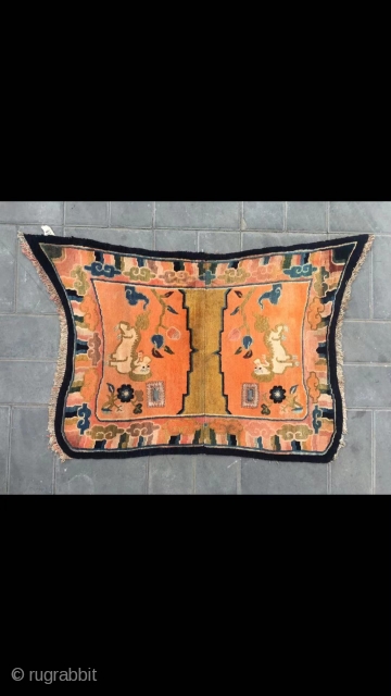 Tibetan butterfly horse saddle, about mid Qing Dynasty. Orange background with snow  mountain lion veins. Good age and condition. Size 120*74cm( 47*29”)
          