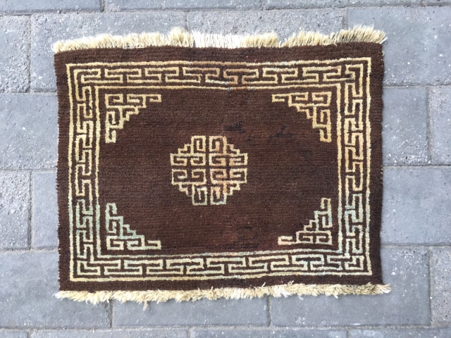 #2065 Tibet rug, brown background with single group pattern, Hui veins selvage. Wool warp and weft. Good age and quality quality. Size 60*47cm (23*18")         