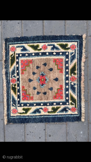 #2091 Tibet rug, camel background with single group flower with Buddha fingers veins. Flower selvage. Good age and quality. Size 58*61cm( 23*24")           