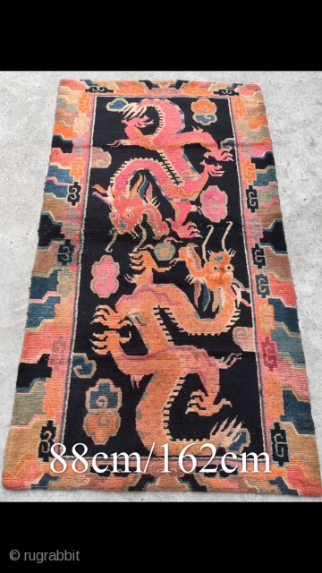 Tibet rug, blue background with double dragon and lucky cloud pattern. Good age and condition. Size 88*162cm(34*63”)                