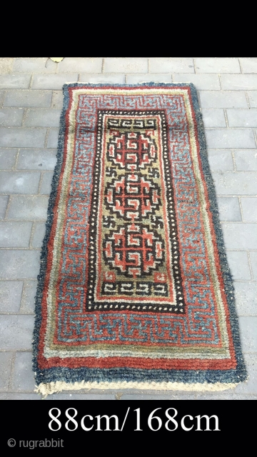 Tibet rug, green background with three medallion veins. Good age and condition. Size 88*168cm(34*66”)                   