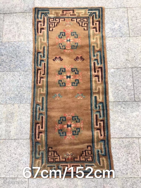 Tibetan rug, brown background with group flower veins. Good age and condition. Size 152*67cm( 59*26”)                  