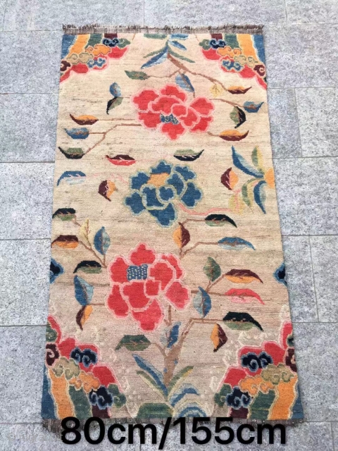 Tibetan rug, Ivory white color , nice three flower and lucky clouds veins. Wool warp and weft. Good age and condition. Size 80*155cm(31*60”)          