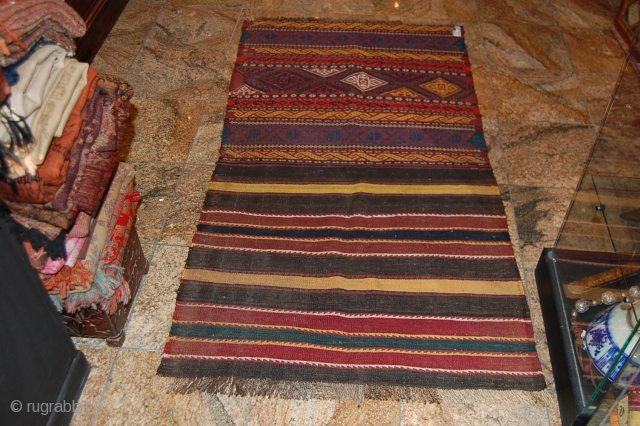 a beautiful tatar kilim. the size is 159 x 79 cm. for more informations, kindly let me know.               