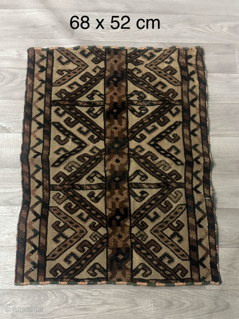 a small antique carpet decoration                            