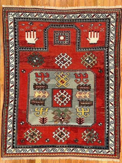 2805 Antique Kazak Prayer pattern. 
4'8" x 3'8"
Cir:1900
The rug has had some restorations.

                    