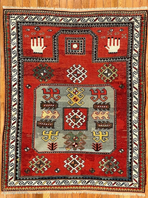 2805 Antique Kazak Prayer pattern. 
4'8" x 3'8"
Cir:1900
The rug has had some restorations.

                    